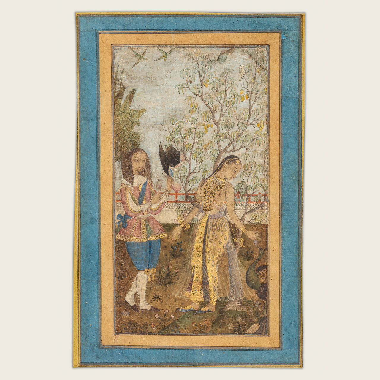 Album page of a couple in a garden